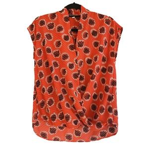 Red abstract pattern sleeveless top with crisscross opening in front XS